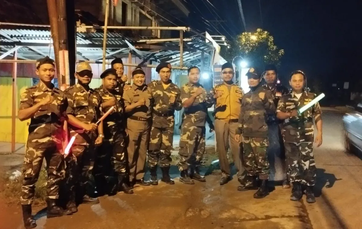 Gerimis Tak Surutkan Banser Guntur Atur Lalin Pada Mujahadah Kubro