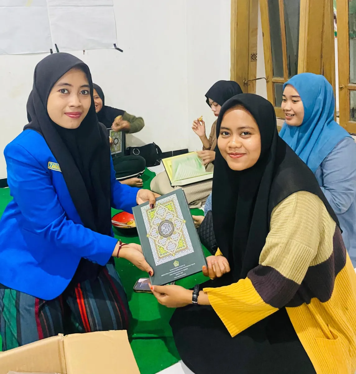 PMII dan KOPRI Demak Gelar Aksi Berbagi Mushaf Al-Qur'an untuk Perkuat Spirit Keislaman Kader